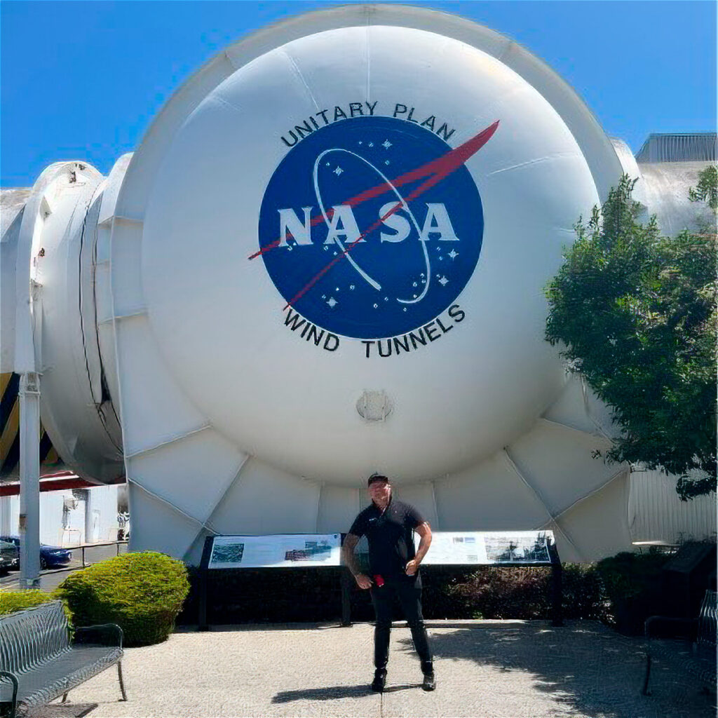 MKS General Manager Alexander Krekker standing in front of the NASA Unitary Plan Wind Tunnels.